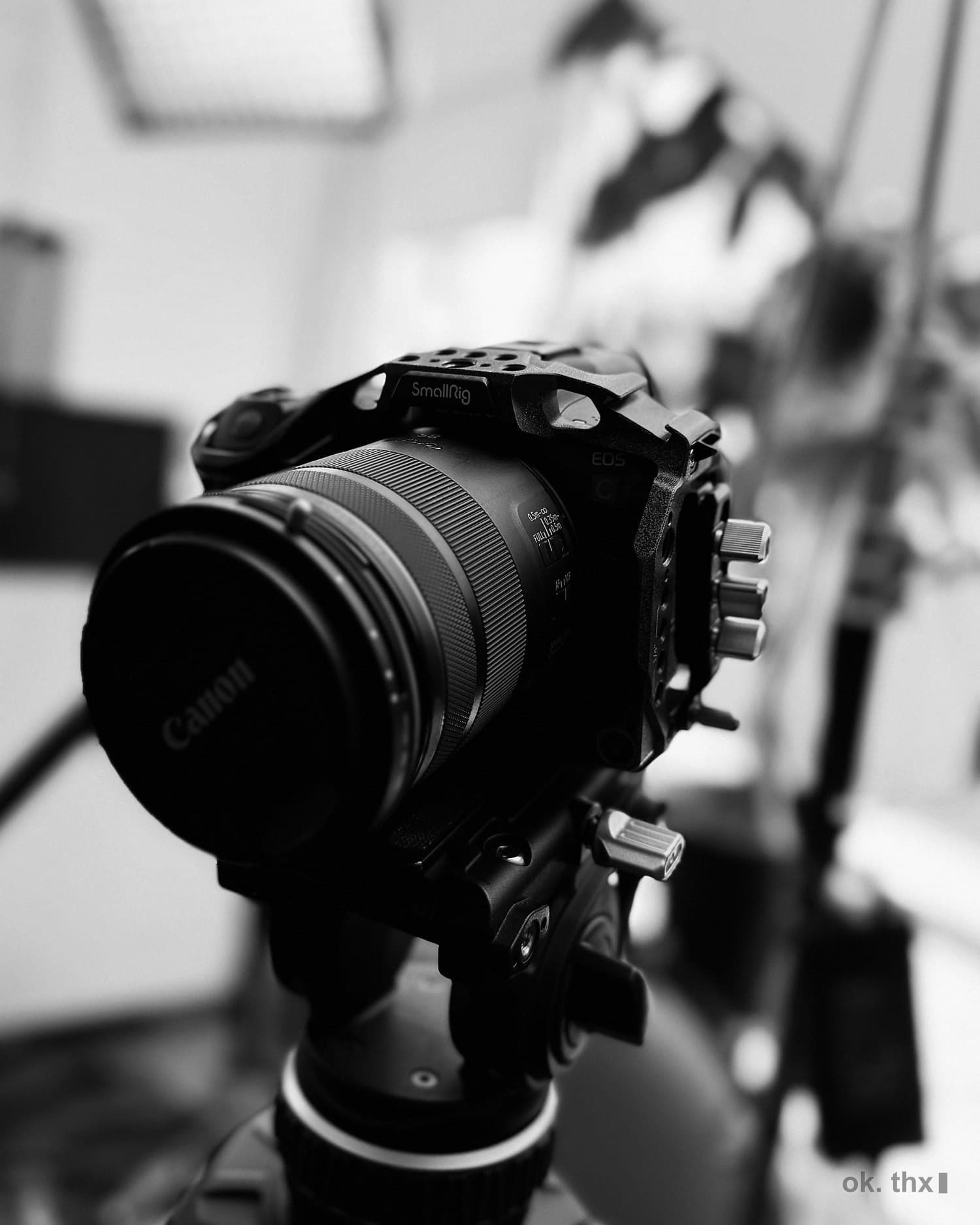 A cinema camera on a tripod in the studio